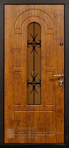 Фото «Дверь с ковкой №12»  в Смоленску